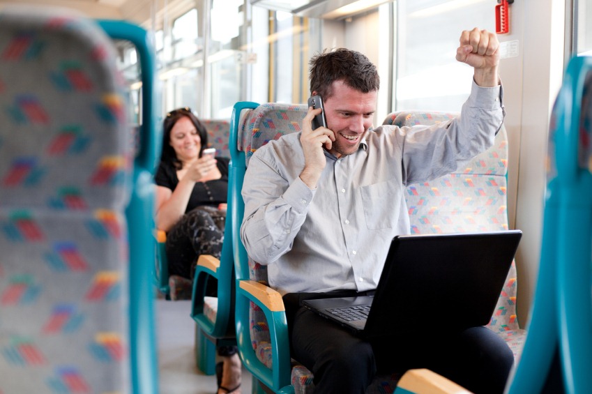 Man-on-Cell-Phone-in-Train.jpg