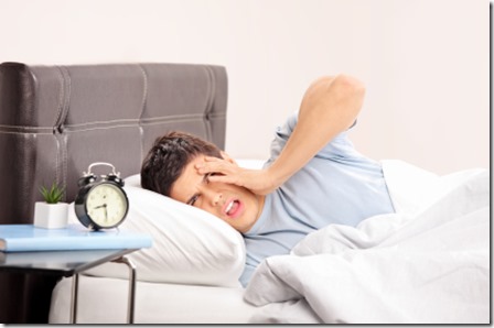 Guy lying on a bed and gesturing late