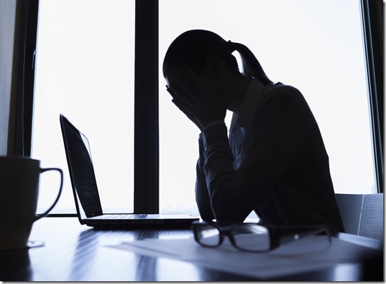 Woman Holding Face in Shame Laptop iStockPhoto PPT