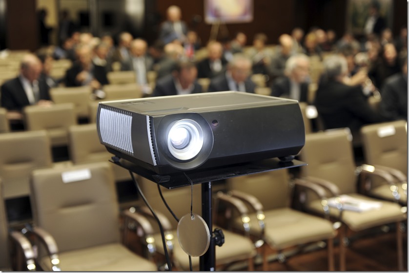 PowerPoint Slide Projector People in Background iStockPhoto