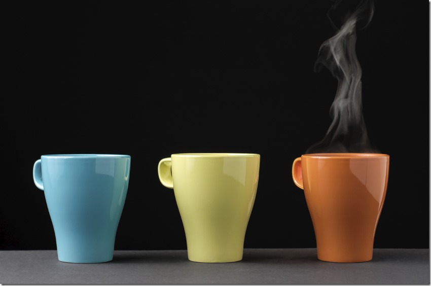 Three colorful mug with steam