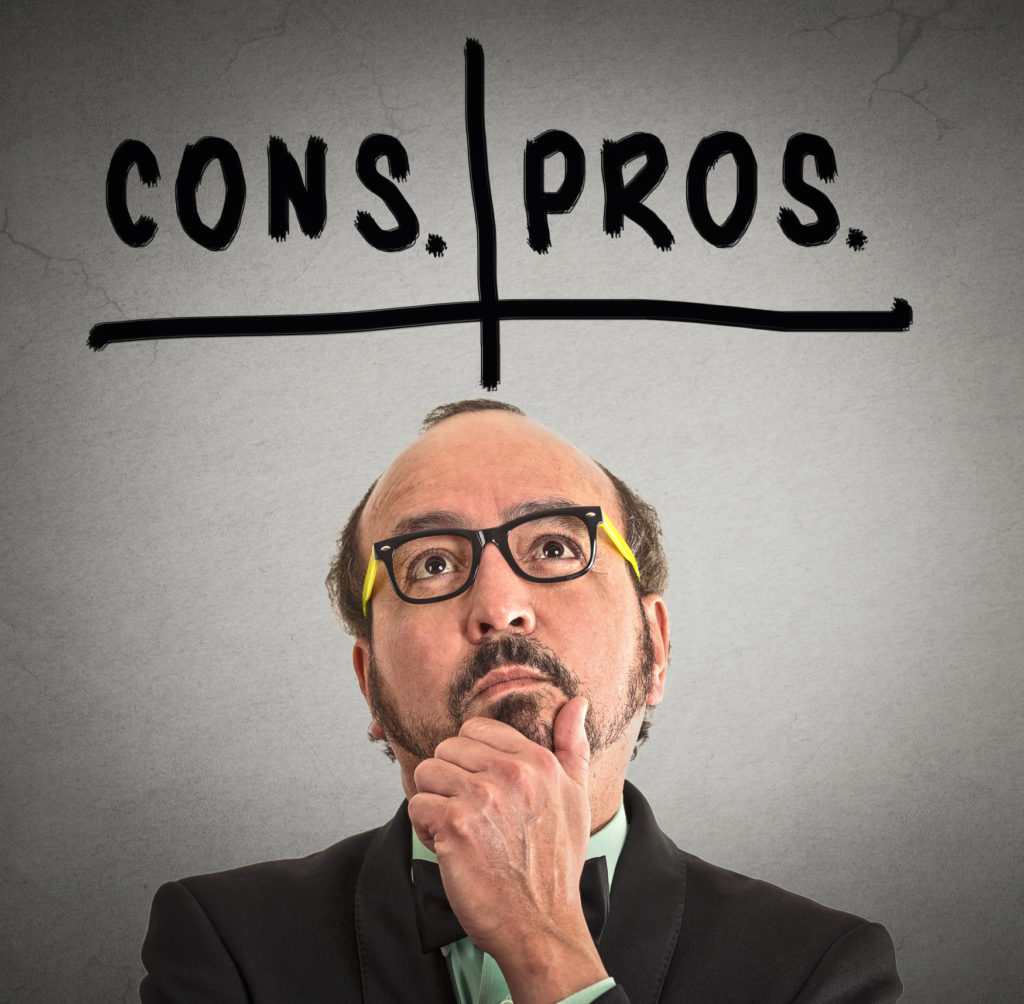 Man with glasses on gray background under pros and cons heading