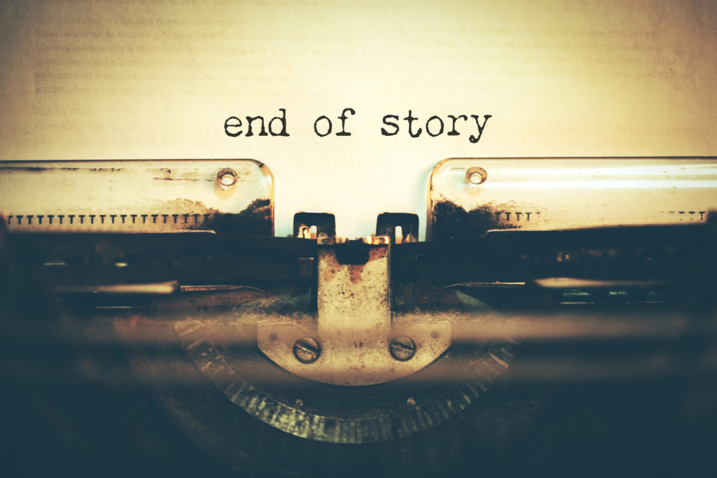 end of story text on typewriter