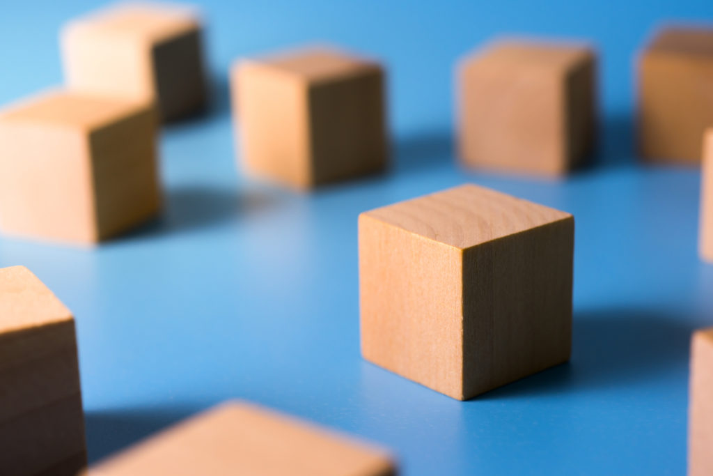 Wooden blocks on a blue base