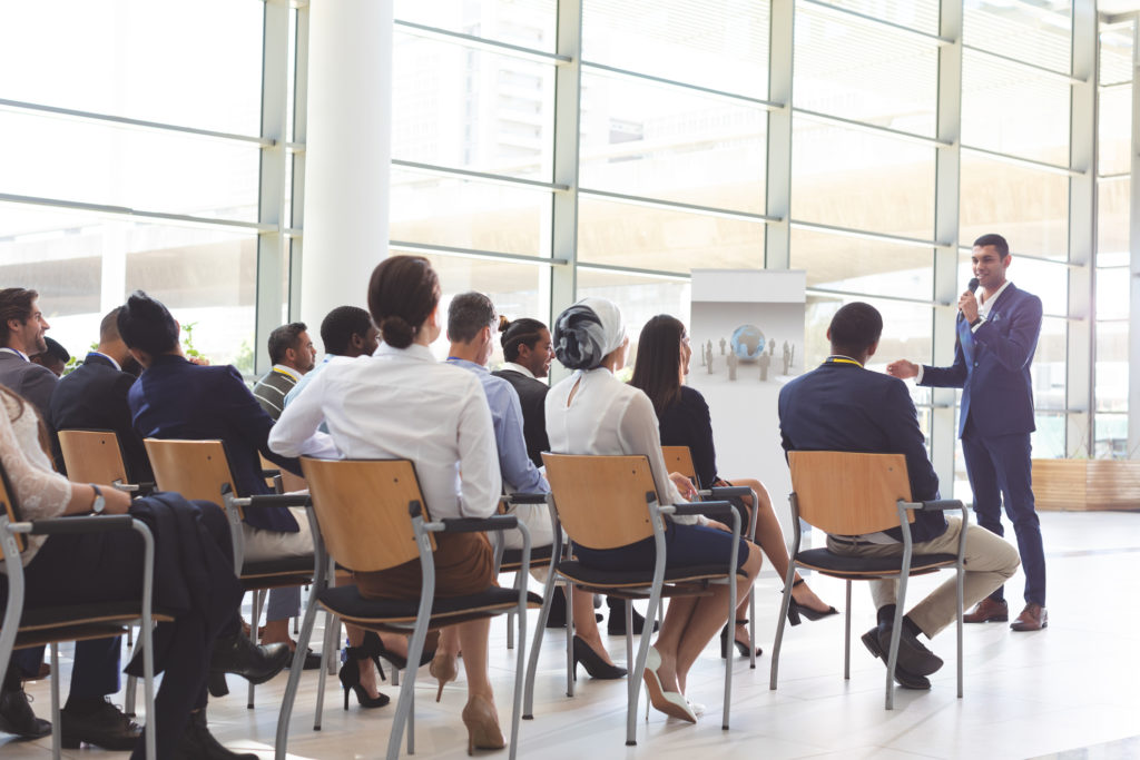 Businessman speaking in a business seminar