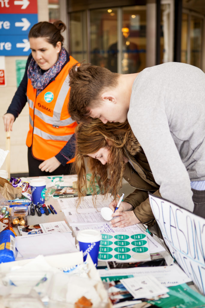 Passersby sign petition on second day of the Forty Eight Hour Strike in London in 2016